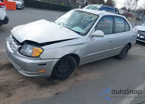 2004 Hyundai Accent Gl from USA, damaged, VIN KMHCG45CX4U499189
